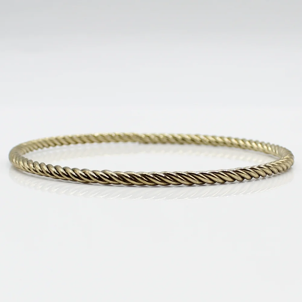 Vintage twisted goldtone bangle bracelet - Picture 2 of 5